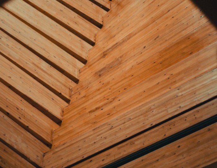 A timber-lined ceiling with even, close-set boards